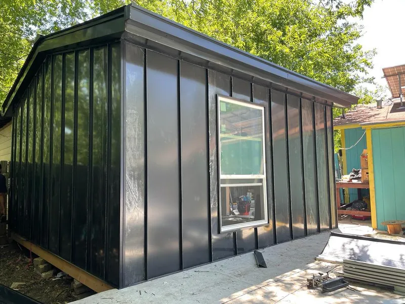 Black standing seam metal wall panels for Metal Roof Installation in Brockton