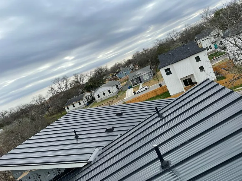 Standing seam metal roof panels with vents for Skylight Repair in Brockton